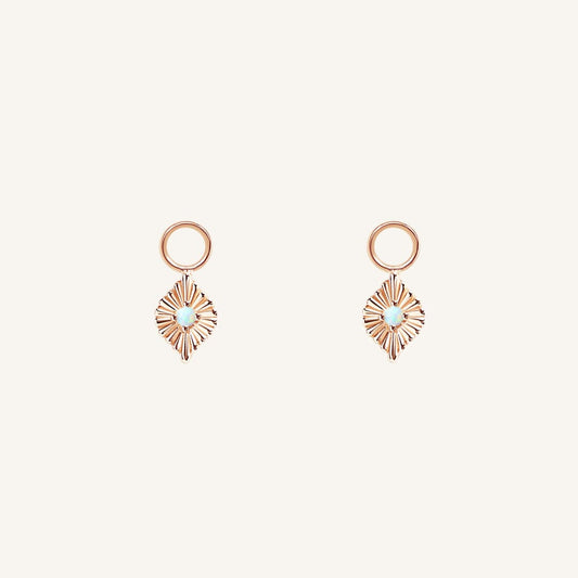 A pair of rose diamond shaped hoop charms featuring a faux opal