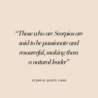 A silver iridescent zodiac charm featuring the sign for Scorpio.