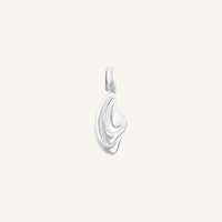 Silver pendant on a light gray background
