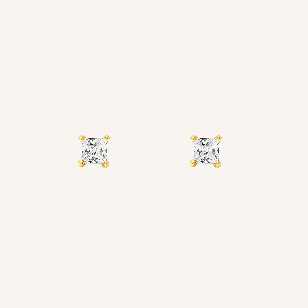 Pair of square cubic zirconia stud earrings on a white background