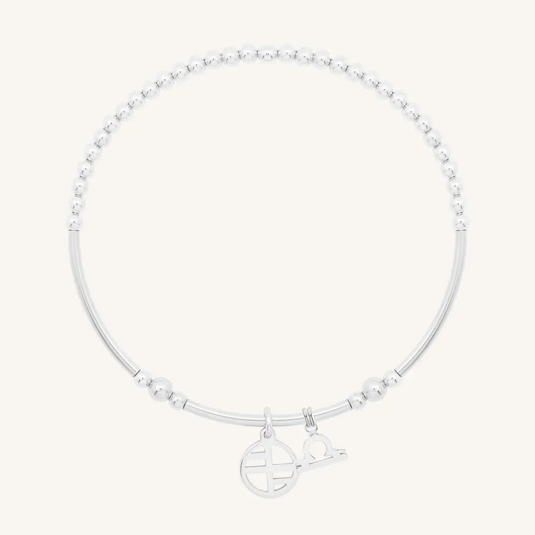The    Petite Zodiac Charm Libra by  Francesca Jewellery from the Charms Collection.