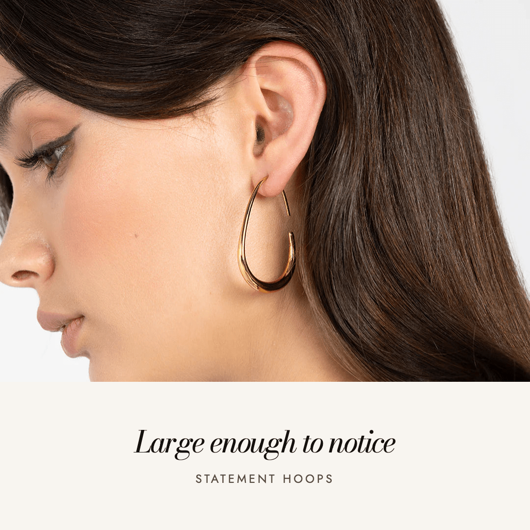 Tate Hoops worn in profile — large enough to notice