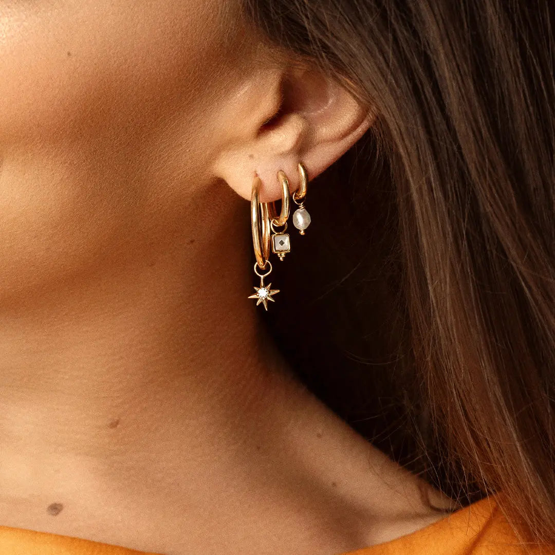 The    Contentment Plain Hoops by  Francesca Jewellery from the Earrings Collection.