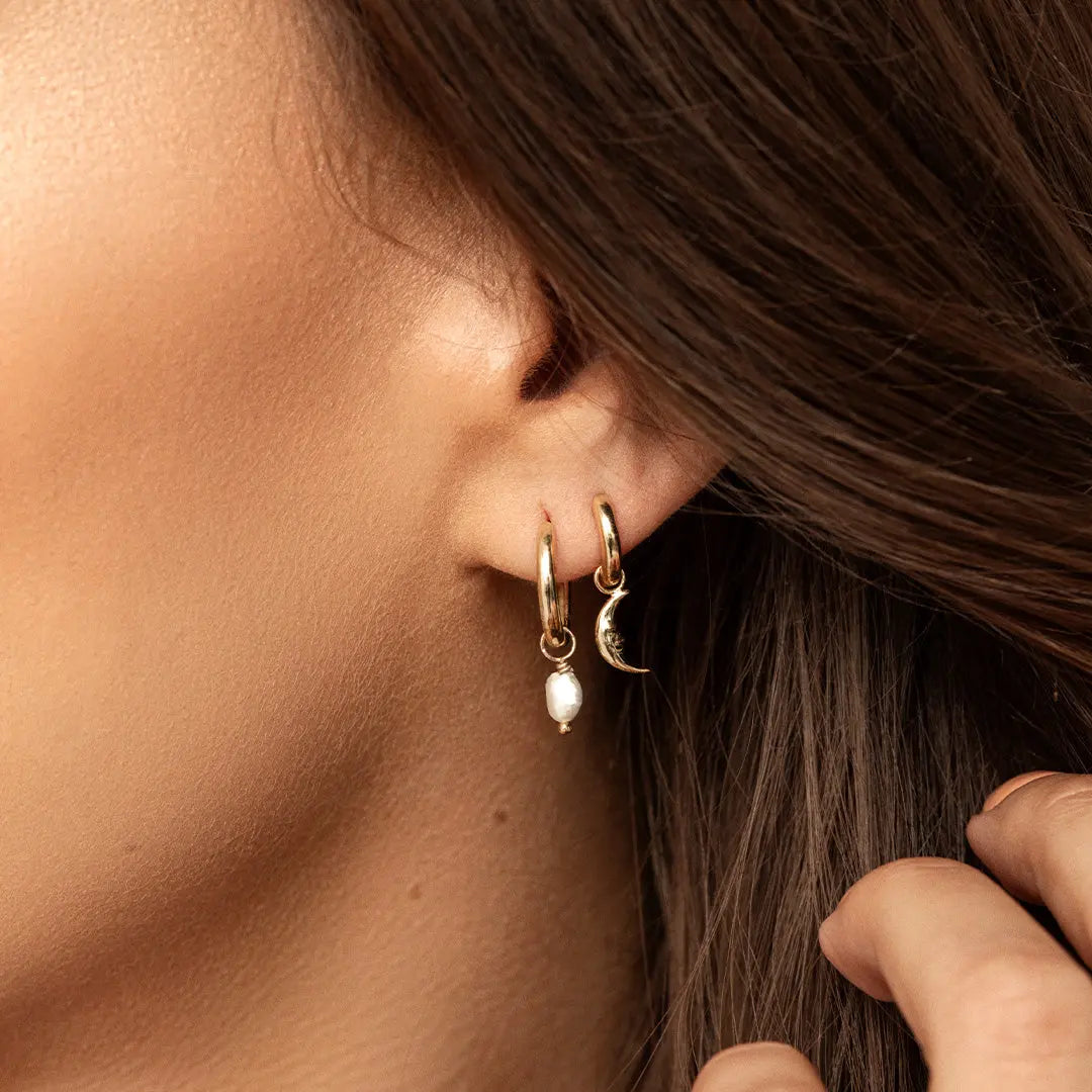The    Pearl Plain Hoops by  Francesca Jewellery from the Earrings Collection.
